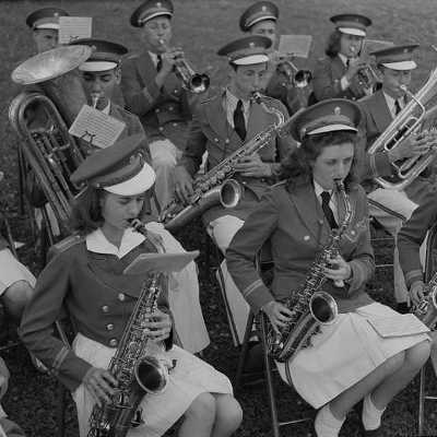 vintage picture of marching band performing while in uniform